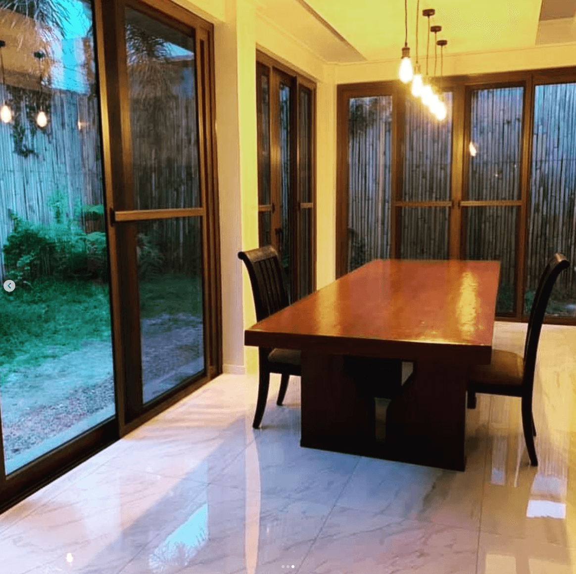 An Old Molave dining table in place